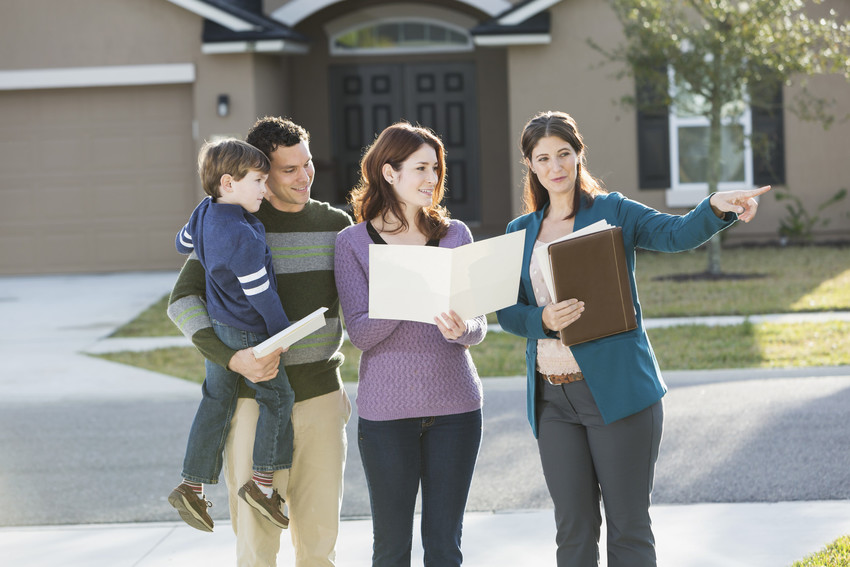 buyers touring a home