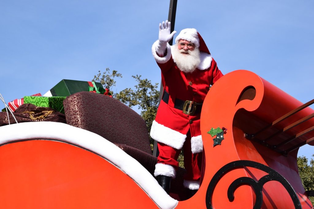 santa waving from sleigh