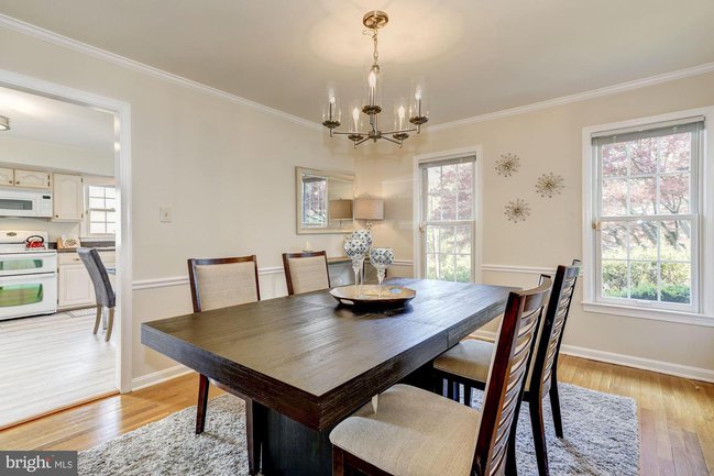formal dining room with chandelier