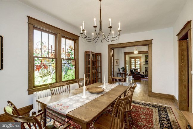 dining room with stained glass windows