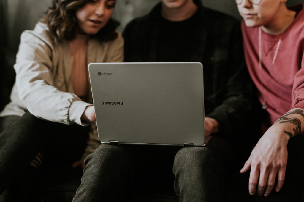Group using a laptop