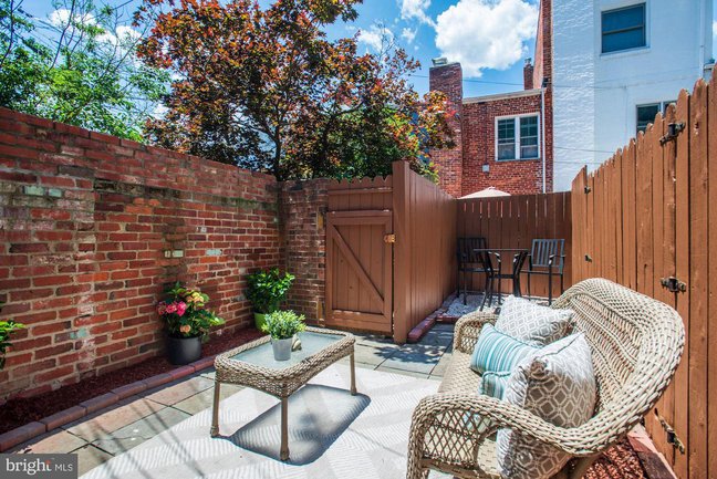 a fenced patio